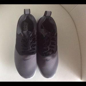 Dark gray and black Nike sneaker size 9